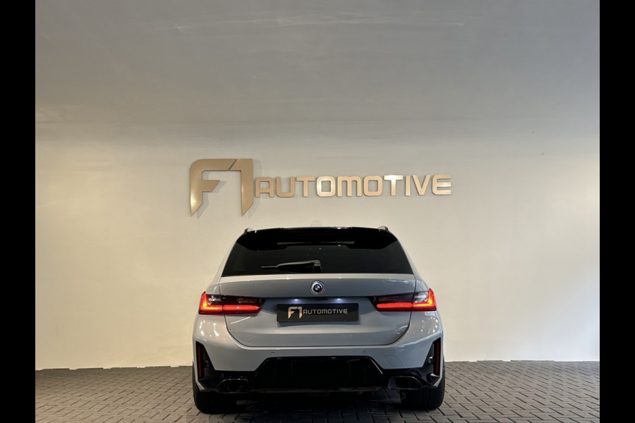 BMW 3 Serie Touring 330e Touring Pano|Drive Assist|Blindspot|H/K|Trekhaak