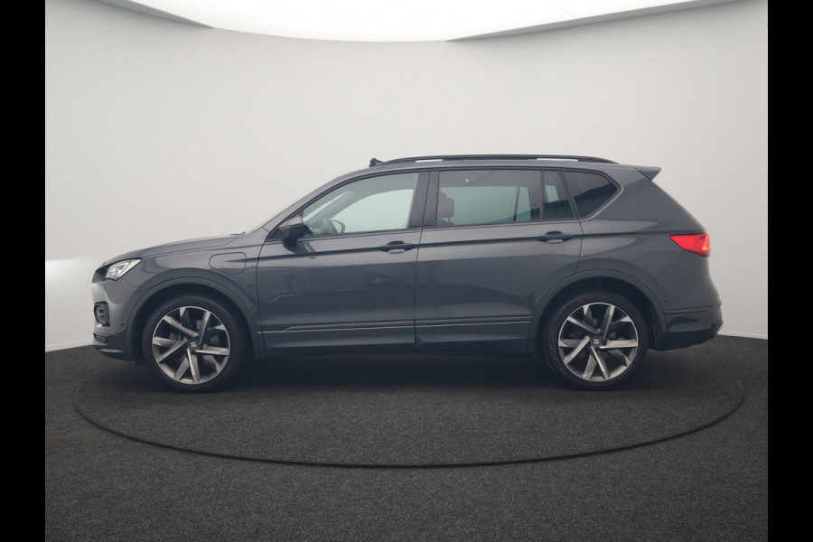 Seat Tarraco 1.4 TSI e-Hybrid FR Business Intense PHEV 245pk Dealer O.H. | Trekhaak Af Fabriek | Panodak | Adaptive Cruise | 360 Camera | Lederen Sportstoelen Memory & Verwarmd | Keyless | Blis | Stuur Verwarmd | Apple Carplay | Navigatie | DAB | 20"L.M | Plug In Hybrid |
