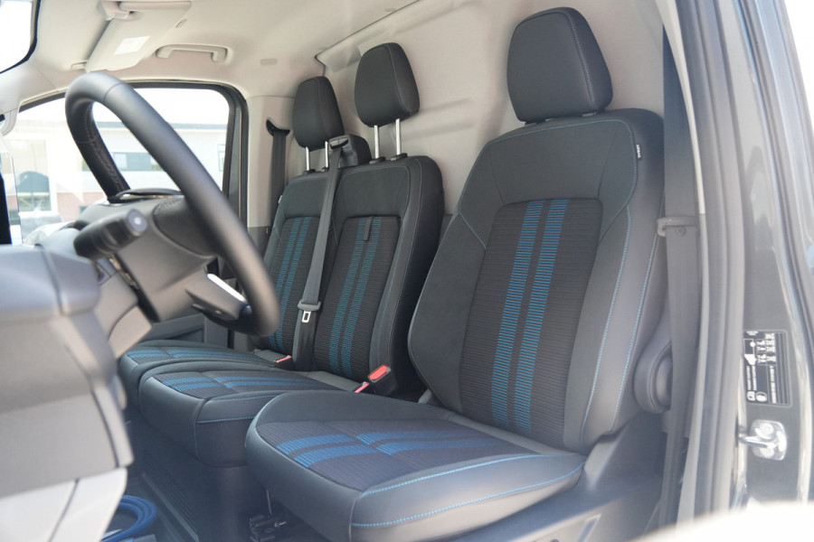 Ford E-Transit Custom 340 L2H1 Sport 71 kWh 218pk - 2x Schuif - ACC - B&O - Navi - Stoel/Stuurverwarming - 360 Camera - Trekhaak - Rijklaar
