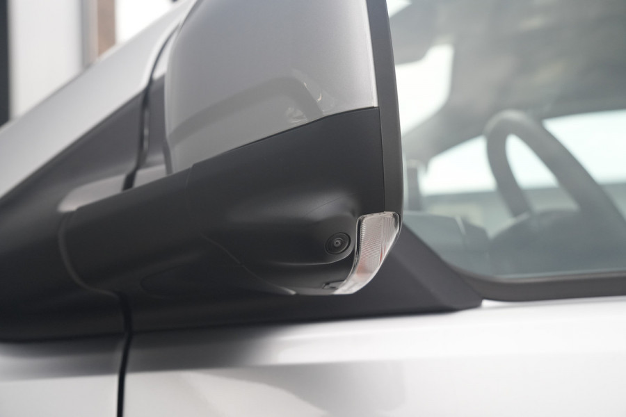 Ford E-Transit Custom 340 L2H1 Sport 71 kWh 218pk - 2x Schuif - ACC - B&O - Navi - Stoel/Stuurverwarming - 360 Camera - Trekhaak - Rijklaar
