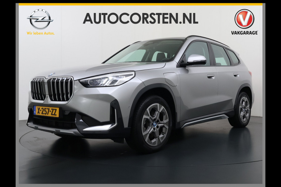 BMW X1 xDrive25e PHEV 245pk AUT-7 Leer Trekhaak Adap.Cruise Camera Navi Dual-Ecc ParkAssist Pdc Apple Carplay Android SOH 97% Hybride Lmv Elek.Achterklep Connect Drive Isofix DAB Led Regen-Lichtsensor Lane Assist Wifi AWD 1.700KG Trekgewicht 1e Eigenaar Dealeronderhouden Origineel Nederlandse Auto