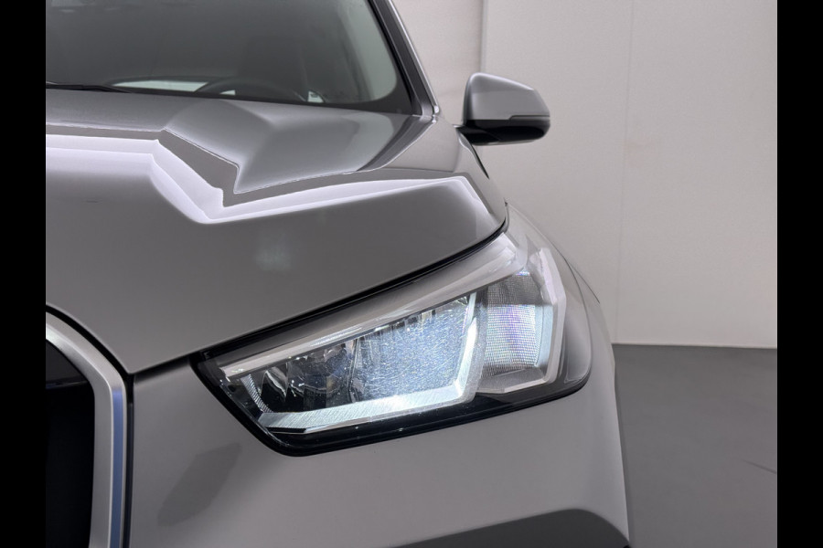 BMW X1 xDrive25e PHEV 245pk AUT-7 Leer Trekhaak Adap.Cruise Camera Navi Dual-Ecc ParkAssist Pdc Apple Carplay Android SOH 97% Hybride Lmv Elek.Achterklep Connect Drive Isofix DAB Led Regen-Lichtsensor Lane Assist Wifi AWD 1.700KG Trekgewicht 1e Eigenaar Dealeronderhouden Origineel Nederlandse Auto