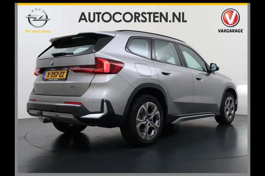 BMW X1 xDrive25e PHEV 245pk AUT-7 Leer Trekhaak Adap.Cruise Camera Navi Dual-Ecc ParkAssist Pdc Apple Carplay Android SOH 97% Hybride Lmv Elek.Achterklep Connect Drive Isofix DAB Led Regen-Lichtsensor Lane Assist Wifi AWD 1.700KG Trekgewicht 1e Eigenaar Dealeronderhouden Origineel Nederlandse Auto