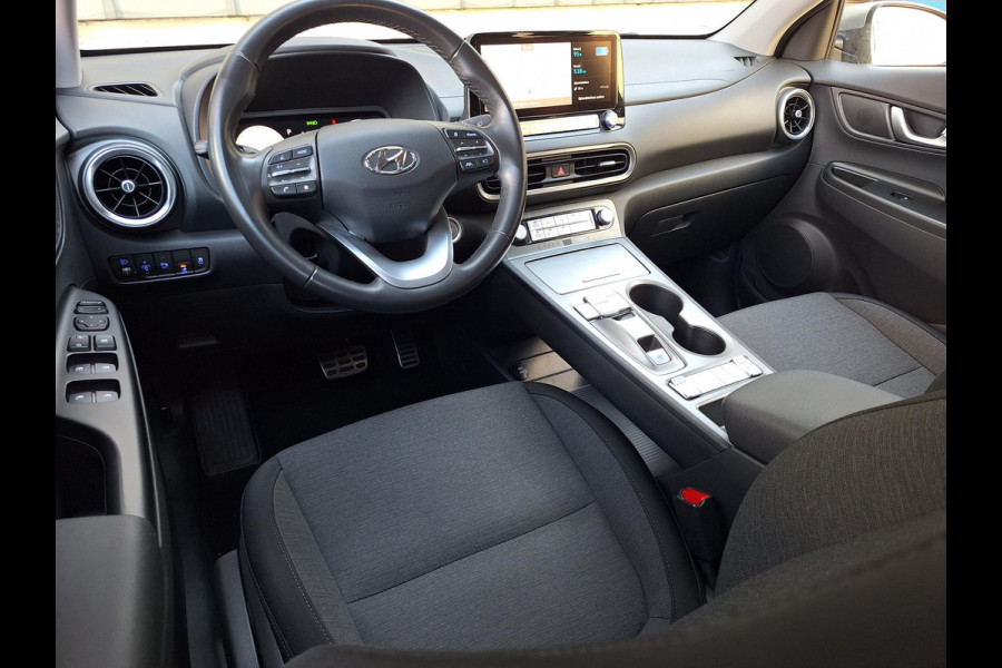 Hyundai Kona EV Comfort Smart 64 kWh | SOH: 97,3% | 3 Fase | Warmtepomp | Climate | Stoel-verwarming | Camera | CC |