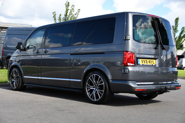 Volkswagen Transporter 2.0 TDI L2H1 32 DC Caravelle Virtual, Adaptieve Cruise, Carplay, LED, Leder, 2 x Electrische deur, Automaat, Clima, Stoelverwarming, Uniek! Bulli / Highline