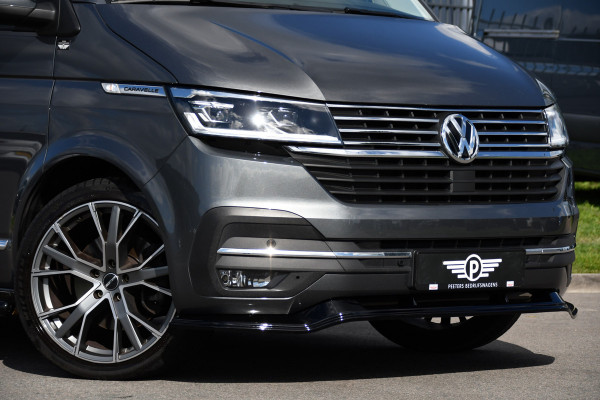 Volkswagen Transporter 2.0 TDI L2H1 32 DC Caravelle Virtual, Adaptieve Cruise, Carplay, LED, Leder, 2 x Electrische deur, Automaat, Clima, Stoelverwarming, Uniek! Bulli / Highline