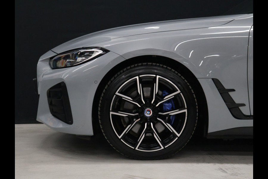 BMW i4 M50 High Executive 84 kWh [TREKHAAK, APPLE CARPLAY, HEAD-UP DISPLAY, STOELVERWARMING, CRUISE CONTROL, CAMERA, PDC V+A, ELEKTRISCHE ACHTERKLEP, NAVIGATIE, LED, LEDER, NIEUWSTAAT]