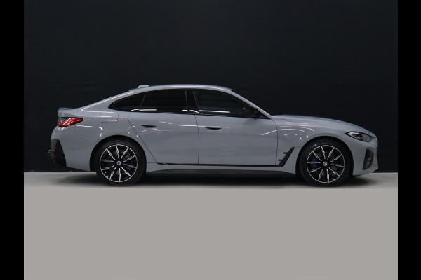BMW i4 M50 High Executive 84 kWh [TREKHAAK, APPLE CARPLAY, HEAD-UP DISPLAY, STOELVERWARMING, CRUISE CONTROL, CAMERA, PDC V+A, ELEKTRISCHE ACHTERKLEP, NAVIGATIE, LED, LEDER, NIEUWSTAAT]