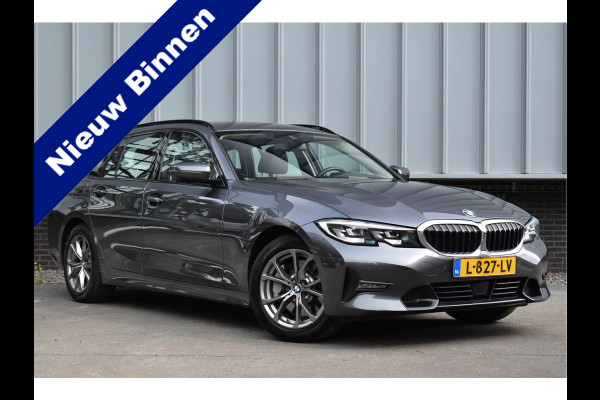 BMW 3 Serie Touring 330i High Executive Aut. | Sfeerverl | Stoelverwarming | Navi | Deal. OH