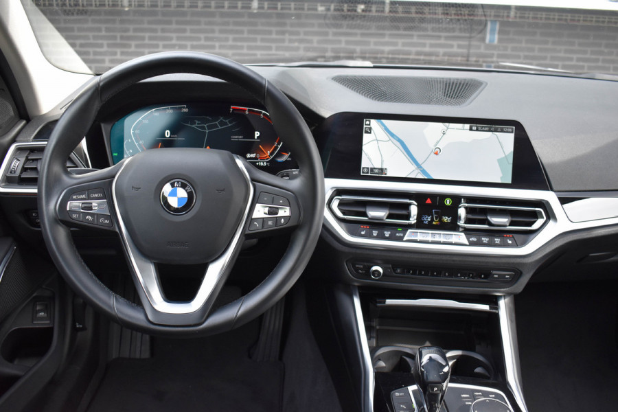 BMW 3 Serie Touring 330i High Executive Aut. | Sfeerverl | Stoelverwarming | Navi | Deal. OH