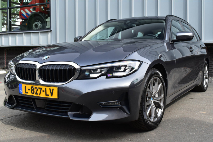 BMW 3 Serie Touring 330i High Executive Aut. | Sfeerverl | Stoelverwarming | Navi | Deal. OH