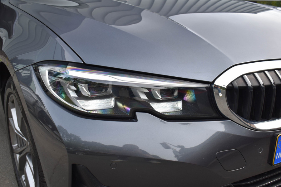 BMW 3 Serie Touring 330i High Executive Aut. | Sfeerverl | Stoelverwarming | Navi | Deal. OH