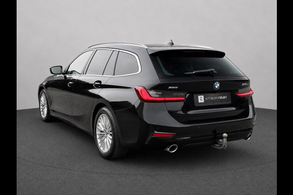 BMW 3 Serie Touring 330e xDrive | Laser | Trekhaak | Head Up | 360 | Sfeerverlichting | Dodehoek | 1e eigenaar