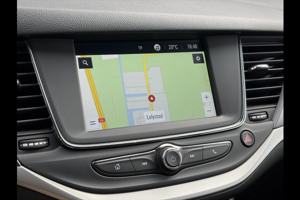 Opel Astra Sports Tourer 1.2 Business Executive ✓1e Eigenaar✓146pk✓Camera✓Trekhaak✓Carplay✓Airco✓Cruise✓Pdc V+A✓Lm velgen✓Comfortstoelen✓6 Bak✓N.A.P✓Nieuwe Apk bij Aflevering