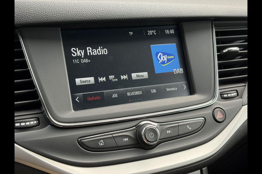 Opel Astra Sports Tourer 1.2 Business Executive ✓1e Eigenaar✓146pk✓Camera✓Trekhaak✓Carplay✓Airco✓Cruise✓Pdc V+A✓Lm velgen✓Comfortstoelen✓6 Bak✓N.A.P✓Nieuwe Apk bij Aflevering