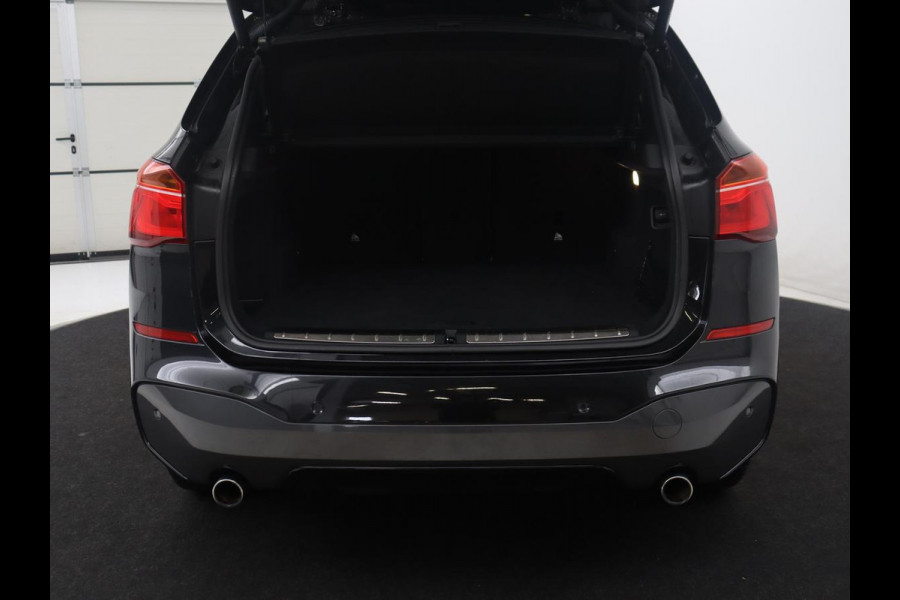 BMW X1 sDrive20i High Executive M-sport | Leder | Memory | Harman/Kardon | Head-up | Cruise control | Stoelverwarming | Climate control | Navigatie | Bluetooth | Park assist | Elektrische achterklep