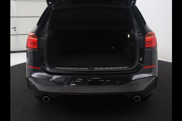 BMW X1 sDrive20i High Executive M-sport | Leder | Memory | Harman/Kardon | Head-up | Cruise control | Stoelverwarming | Climate control | Navigatie | Bluetooth | Park assist | Elektrische achterklep