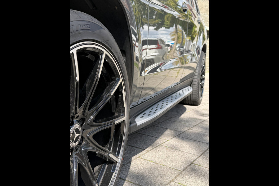 Mercedes-Benz GLS 400 4MATIC - Panorama-schuifdak I Navigatie I Leer I Airco I 7 Pers I 22 inch Sport velgen I LED I PDC I Enz....