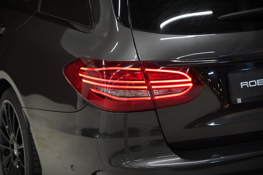 Mercedes-Benz C-Klasse Estate 300 e Business Solution AMG | Panoramadak | Stoelverwarming | 360 Camera | Dodehoekdetectie | Cruise Control | Apple Carplay | Navigatie | Trekhaak | DAB | Ambiance Verlichting | Multibeam | SOH 89,49%