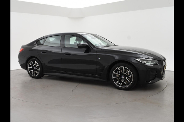 BMW i4 eDrive40 84 kWh M-SPORT + ADAPTIVE CRUISE | SFEERVERLICHTING | LEDER SPORTINTERIEUR