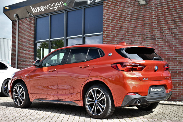 BMW X2 xDrive25e M-Sport | Pano | HUD | Sunset orange | 19 inch | Camera