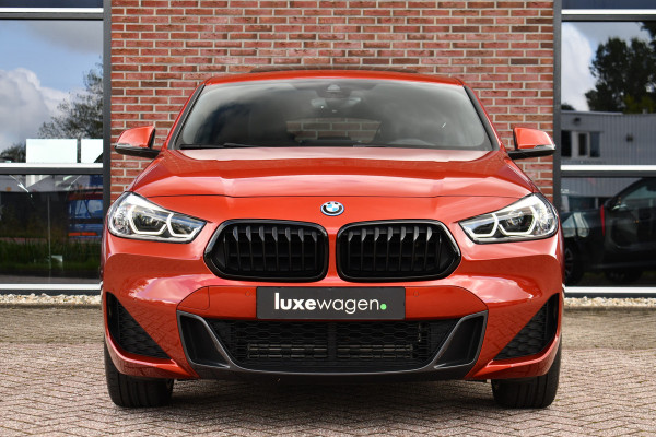 BMW X2 xDrive25e M-Sport | Pano | HUD | Sunset orange | 19 inch | Camera