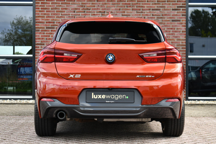 BMW X2 xDrive25e M-Sport | Pano | HUD | Sunset orange | 19 inch | Camera