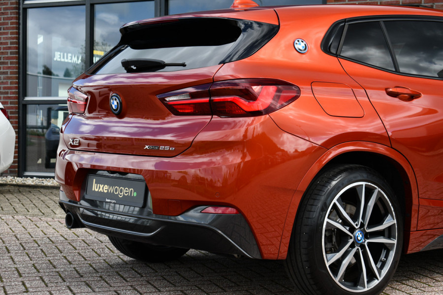 BMW X2 xDrive25e M-Sport | Pano | HUD | Sunset orange | 19 inch | Camera