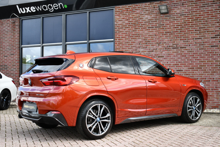 BMW X2 xDrive25e M-Sport | Pano | HUD | Sunset orange | 19 inch | Camera