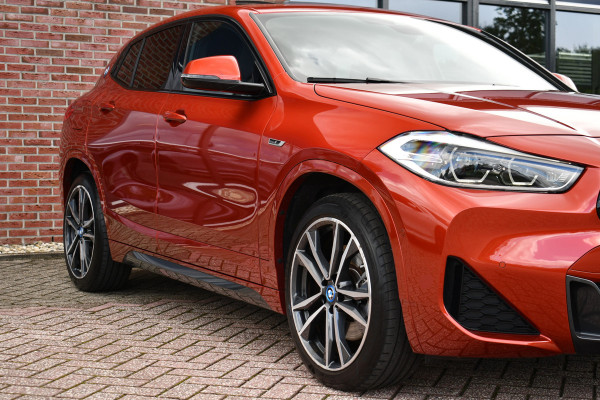 BMW X2 xDrive25e M-Sport | Pano | HUD | Sunset orange | 19 inch | Camera