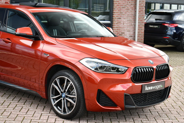 BMW X2 xDrive25e M-Sport | Pano | HUD | Sunset orange | 19 inch | Camera