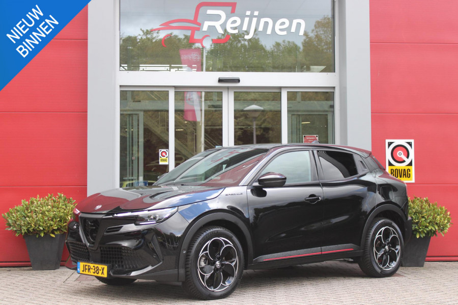 Alfa Romeo junior ELETTRICA SPECIALE 156PK 54 kWh | TECHNOLOGIE PAKKET (O.A. FULL LED ADAPTIVE MATRIX KOPLAMPEN/DODEHOEK DETECTIE/DRAADLOZE TELEFOONLADER/ACHTERUITRIJ CAMERA/PARKEERSENSOREN VOOR, ACHTER,ZIJKANT) | DRAADLOZE APPLE CARPLAY/ANDROID AUTO | CLIMATE CONTROL | ELEKTRISCH BEDIENBARE ACHTERKLEP | STOEL VERWARMING | ELEKTRISCH BEDIENBARE VOORSTOEL MET MASAGEFUNCTIE | VERKEERSBORDEN HERKENNING | ADAPTIVE CRUISE CONTROL | KEYLESS ENTRY/START |