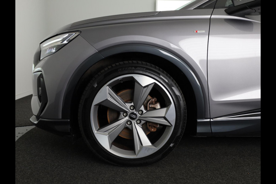 Audi Q4 Sportback e-tron 40 S edition 77 kWh 204 pk | Navigatie | Warmtepomp | Panoramadak | Parkeersensoren | Achteruitrijcamera | Lederen bekleding | Lichtmetalen velgen 21" | SONOS soundsystem | S-Line |
