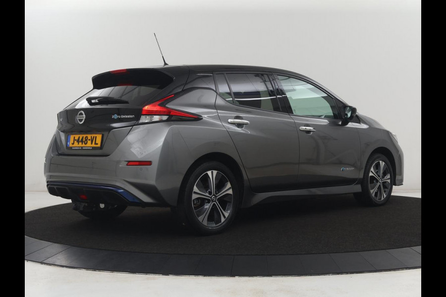 Nissan LEAF e+ Tekna 62 kWh | SOH 89.4% | Leder | Stuur/stoel verwarming | 360 camera | Adaptive cruise | Carplay | BOSE sound | Climate control | Dodehoek detectie | Full LED | Trekhaak |
