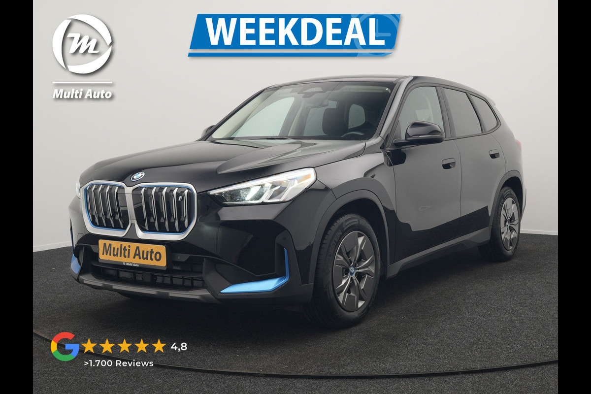 BMW iX1 xDrive30 67 kWh 313pk Dealer O.H. | Adaptief M Onderstel | Camera | Cruise Control | Stoelverwarming | Widescreen Navi | Park Assist | Apple Carplay | Navigatie | DAB | Standkachel |