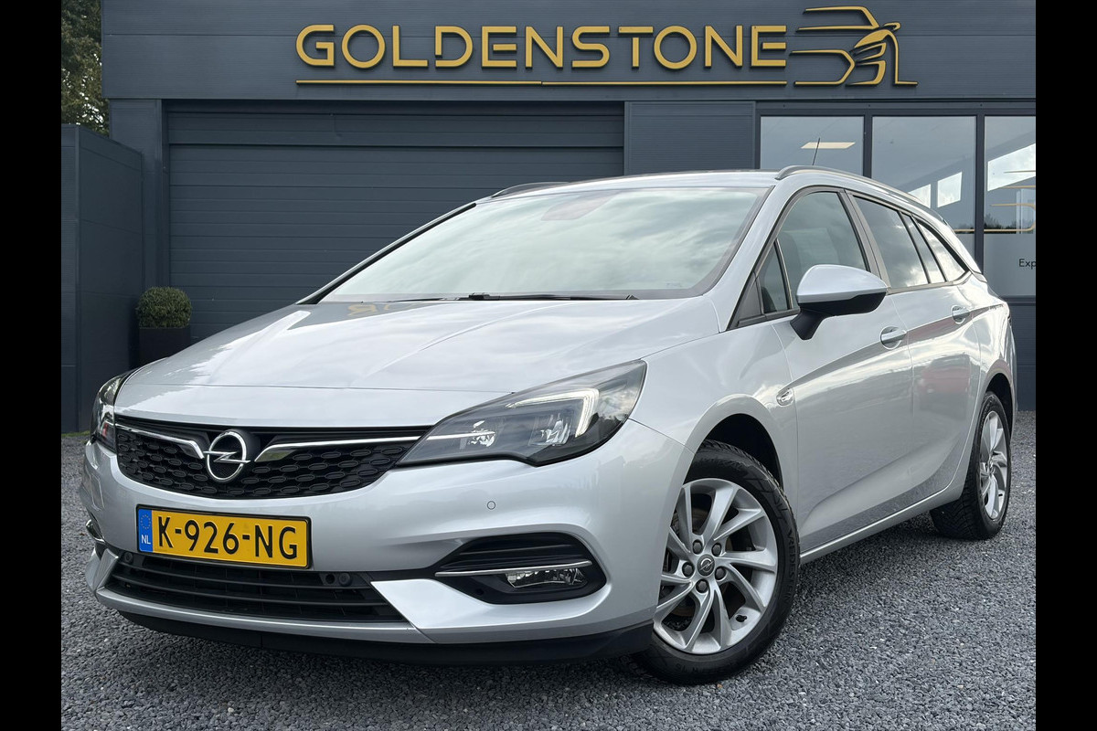 Opel Astra Sports Tourer 1.2 Business Executive ✓1e Eigenaar✓146pk✓Camera✓Trekhaak✓Carplay✓Airco✓Cruise✓Pdc V+A✓Lm velgen✓Comfortstoelen✓6 Bak✓N.A.P✓Apk tot 11-2028