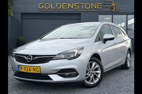 Opel Astra Sports Tourer 1.2 Business Executive ✓1e Eigenaar✓146pk✓Camera✓Trekhaak✓Carplay✓Airco✓Cruise✓Pdc V+A✓Lm velgen✓Comfortstoelen✓6 Bak✓N.A.P✓Apk tot 11-2028