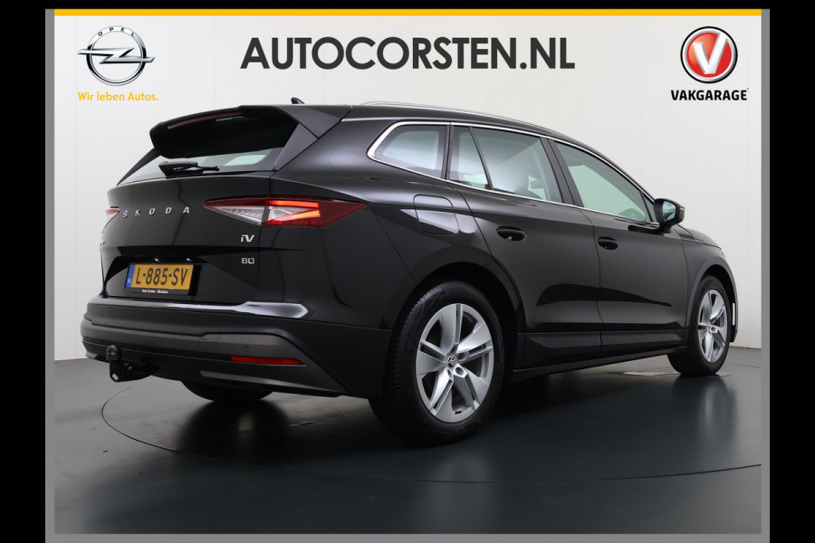 Škoda ENYAQ iV 80 204PK Warmtepomp Trekhaak SOH 92% Camera 3-Zone Ecc Stoel+Stuur+Achterbankverwarming Navi Apple Carplay Android Auto P-Assist Lmv Led Isofix Cruise Control Keyless-go Rijstrooksensor met correctie 1.000KG Trekgewicht 1e Eigenaar Origineel Nederlandse Auto
