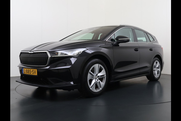 Škoda ENYAQ iV 80 204PK Warmtepomp Trekhaak SOH 92% Camera 3-Zone Ecc Stoel+Stuur+Achterbankverwarming Navi Apple Carplay Android Auto P-Assist Lmv Led Isofix Cruise Control Keyless-go Rijstrooksensor met correctie 1.000KG Trekgewicht 1e Eigenaar Origineel Nederlandse Auto