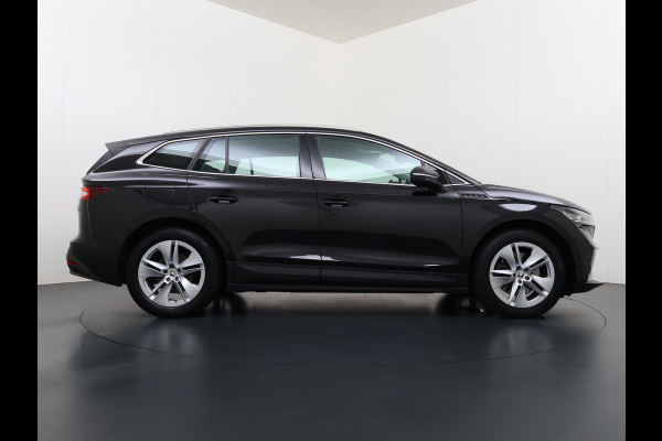 Škoda ENYAQ iV 80 204PK Warmtepomp Trekhaak SOH 92% Camera 3-Zone Ecc Stoel+Stuur+Achterbankverwarming Navi Apple Carplay Android Auto P-Assist Lmv Led Isofix Cruise Control Keyless-go Rijstrooksensor met correctie 1.000KG Trekgewicht 1e Eigenaar Origineel Nederlandse Auto