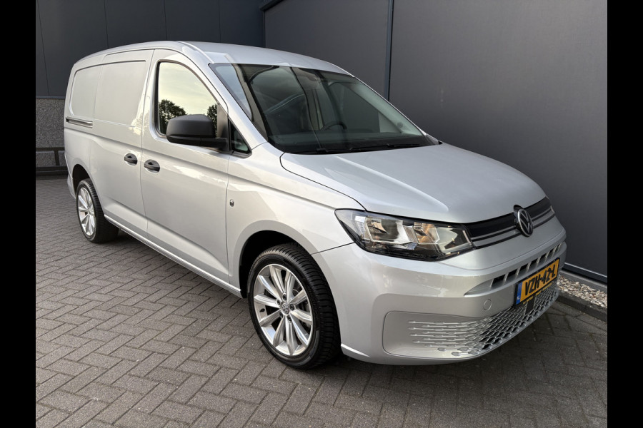 Volkswagen Caddy Cargo Maxi 2.0 TDI Comfort Airco - Apple carplay - Parkeersensor achter - Zijschuifdeur rechts - Tussenschot volledig - Zijwandbekleding laadruimte - Cruise control - Bluetooth - Start/stop systeem - Elektrische ramen - Stuur multifunctioneel - Regensensor