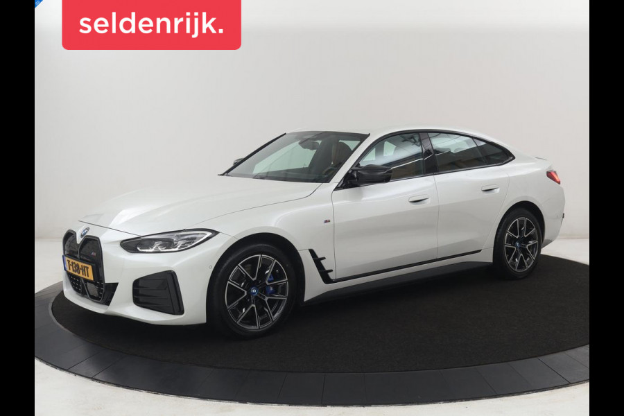 BMW i4 M50 High Executive 84 kWh | SOH 94.5% | Leder | Adaptive cruise | M-Sport stoelen | Head up | 360 camera | Memory | Stuur/stoel verwarming | M-sport stuur |