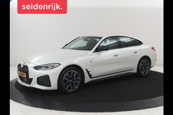 BMW i4 M50 High Executive 84 kWh | SOH 94.5% | Leder | Adaptive cruise | M-Sport stoelen | Head up | 360 camera | Memory | Stuur/stoel verwarming | M-sport stuur |