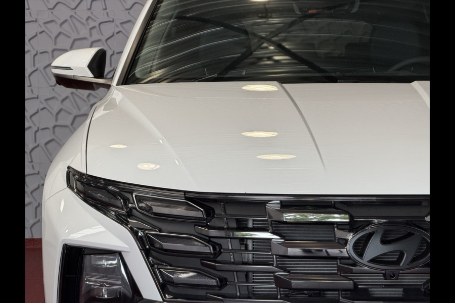 Hyundai Tucson 1.6 T-GDI PHEV N-LINE 360.CAMERA WIT ELEK.KLEP ELEK.STOEL/GEHEUGEN VERWARMD/KOELING SUBWFR 19"LMV ZWARTE HEMEL STUURVERW. PLUG IN HYBRIDE