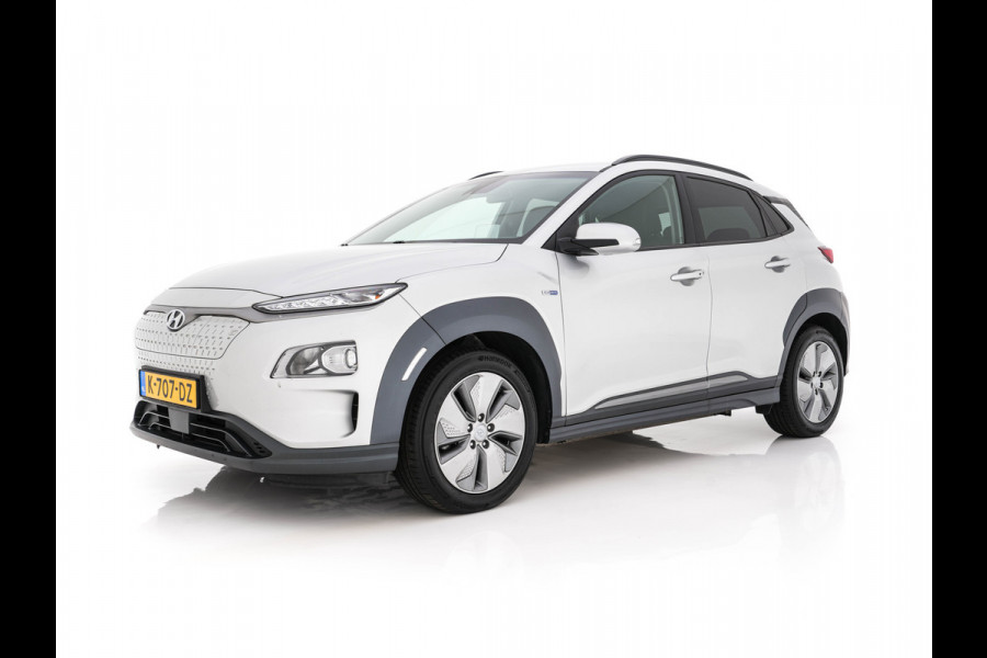 Hyundai Kona EV Fashion 64 kWh (3-Fase) {SOH-100%} (INCL-BTW)  Aut *HEATPUMP | NAVI-FULLMAP | LEATHER-FABRIC | KEYLESS | CAMERA | DAB | ECC | ADAPTIVE-CRUISE | LANE-ASSIST | HEATED-SEATS | PRIVACY-GLASS | HEAD-UP | SHIFTPADDLES | 17"ALU*