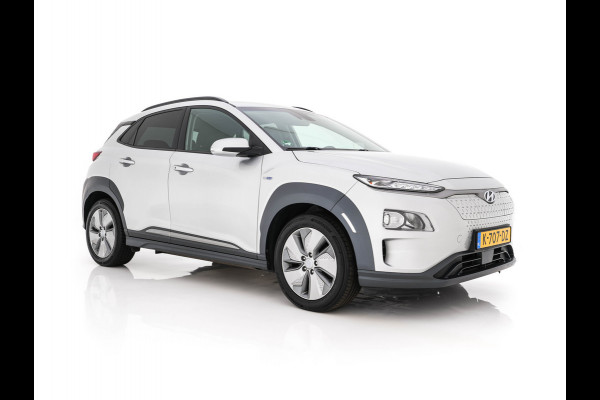 Hyundai Kona EV Fashion 64 kWh (3-Fase) {SOH-100%} (INCL-BTW)  Aut *HEATPUMP | NAVI-FULLMAP | LEATHER-FABRIC | KEYLESS | CAMERA | DAB | ECC | ADAPTIVE-CRUISE | LANE-ASSIST | HEATED-SEATS | PRIVACY-GLASS | HEAD-UP | SHIFTPADDLES | 17"ALU*