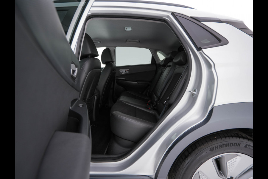 Hyundai Kona EV Fashion 64 kWh (3-Fase) {SOH-100%} (INCL-BTW)  Aut *HEATPUMP | NAVI-FULLMAP | LEATHER-FABRIC | KEYLESS | CAMERA | DAB | ECC | ADAPTIVE-CRUISE | LANE-ASSIST | HEATED-SEATS | PRIVACY-GLASS | HEAD-UP | SHIFTPADDLES | 17"ALU*