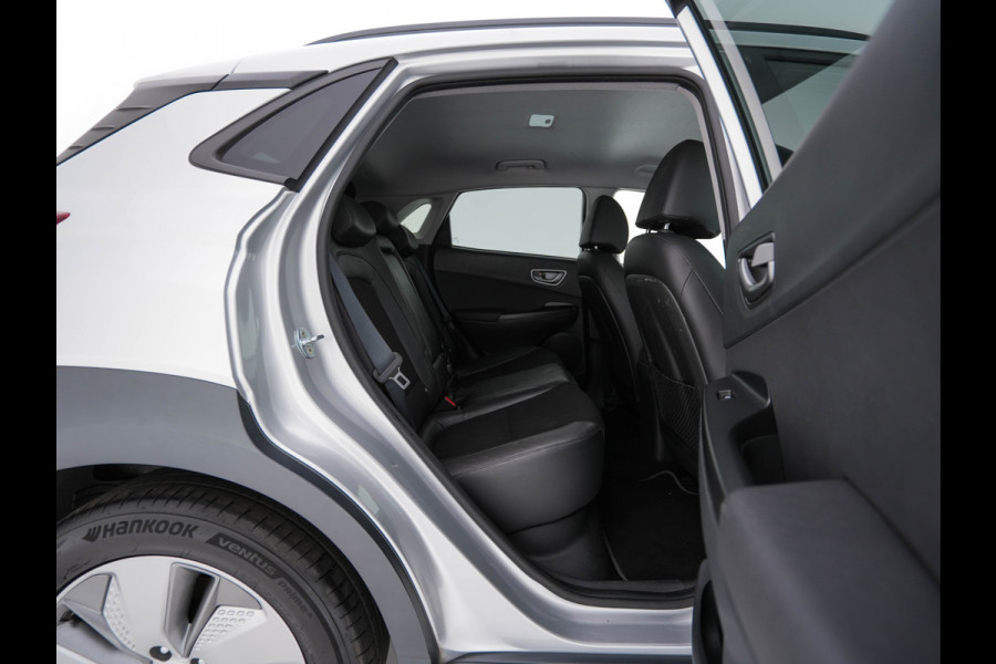 Hyundai Kona EV Fashion 64 kWh (3-Fase) {SOH-100%} (INCL-BTW)  Aut *HEATPUMP | NAVI-FULLMAP | LEATHER-FABRIC | KEYLESS | CAMERA | DAB | ECC | ADAPTIVE-CRUISE | LANE-ASSIST | HEATED-SEATS | PRIVACY-GLASS | HEAD-UP | SHIFTPADDLES | 17"ALU*