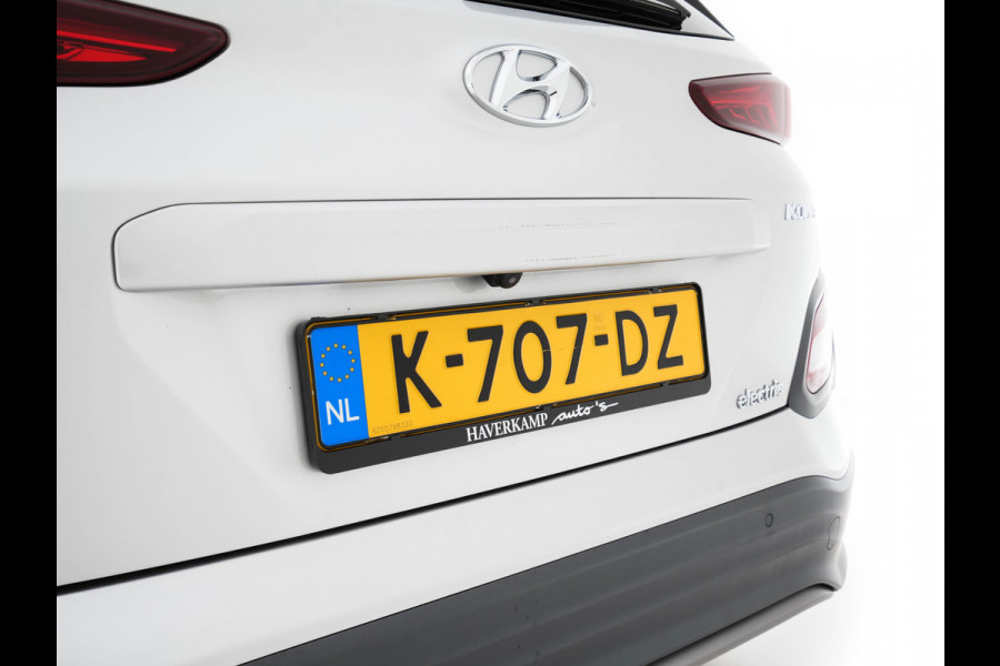 Hyundai Kona EV Fashion 64 kWh (3-Fase) {SOH-100%} (INCL-BTW)  Aut *HEATPUMP | NAVI-FULLMAP | LEATHER-FABRIC | KEYLESS | CAMERA | DAB | ECC | ADAPTIVE-CRUISE | LANE-ASSIST | HEATED-SEATS | PRIVACY-GLASS | HEAD-UP | SHIFTPADDLES | 17"ALU*