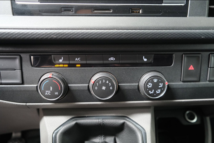 Volkswagen Transporter 2.0 TDI L2H1 30 3p - Airco, Cruise, Stoelverwarming, PDC, Trekhaak.